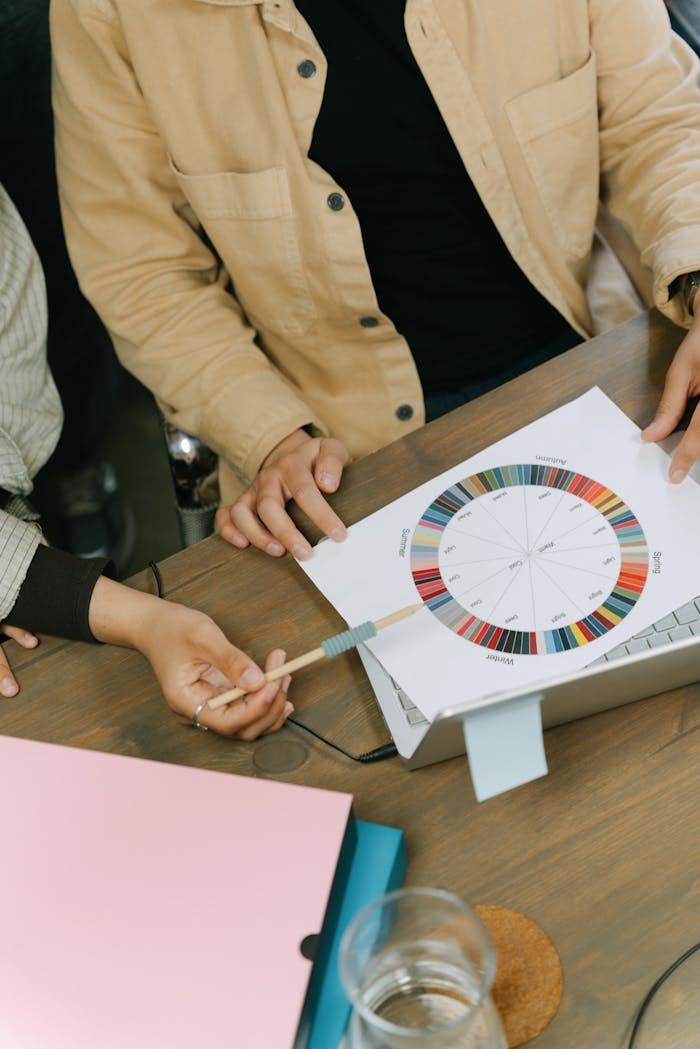 Coworkers Discussing a Color Chart